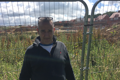 LibDem Wealden District Councillor Neil Cleaver at the polluted pond, Cuckoo Meadow, Hailsham, July 3, 2020 - photo by Katrina Best